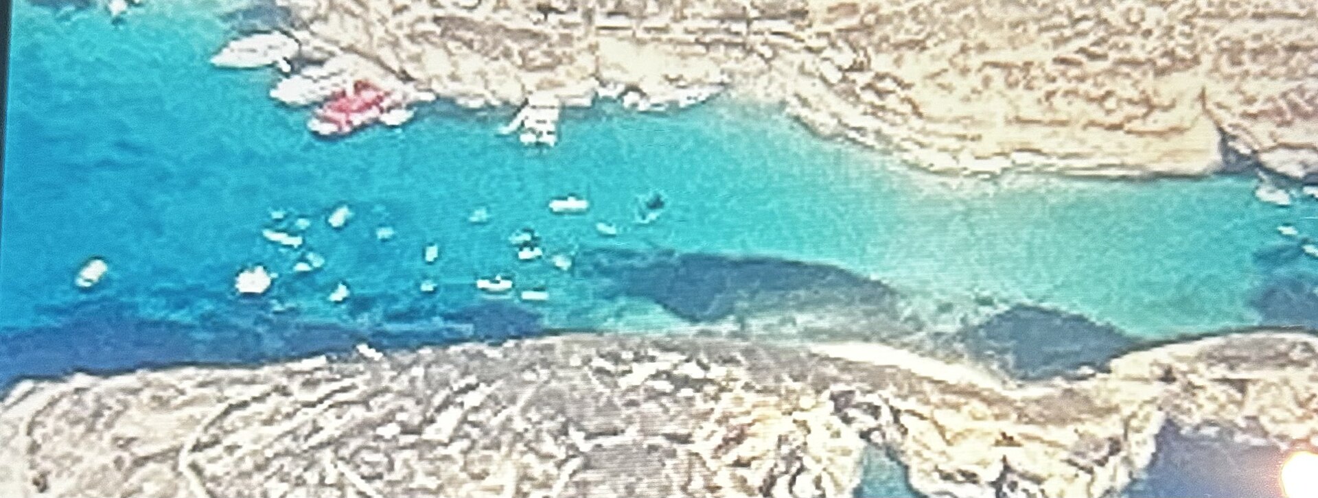 Turquoise water of the Blue Lagoon between Comino and Cominotto, Malta