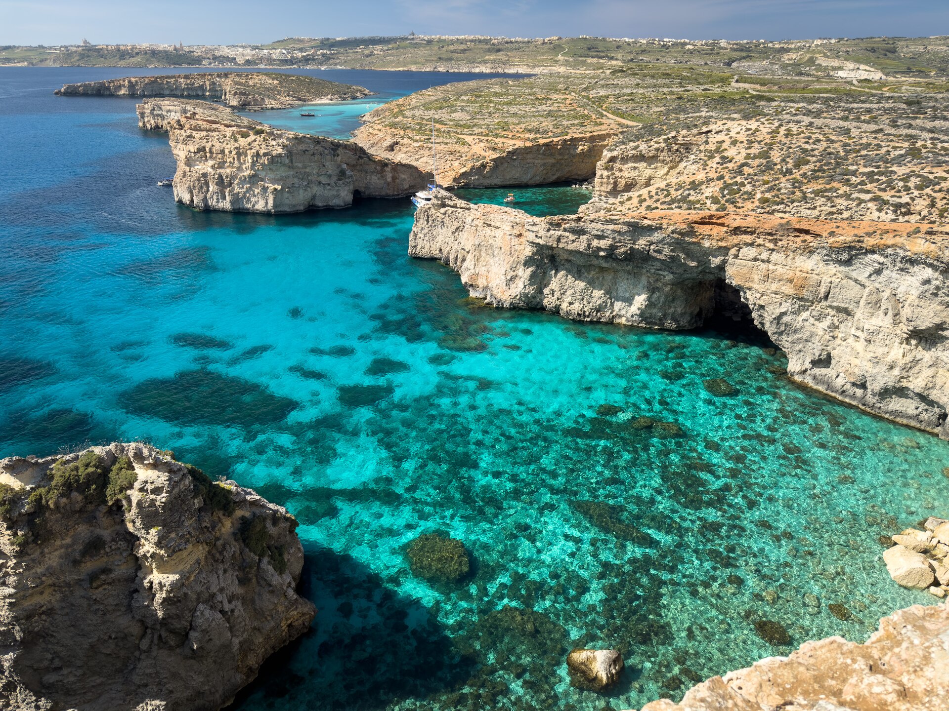 Clear shallow turquoise water at the Blue Lagoon, Comino